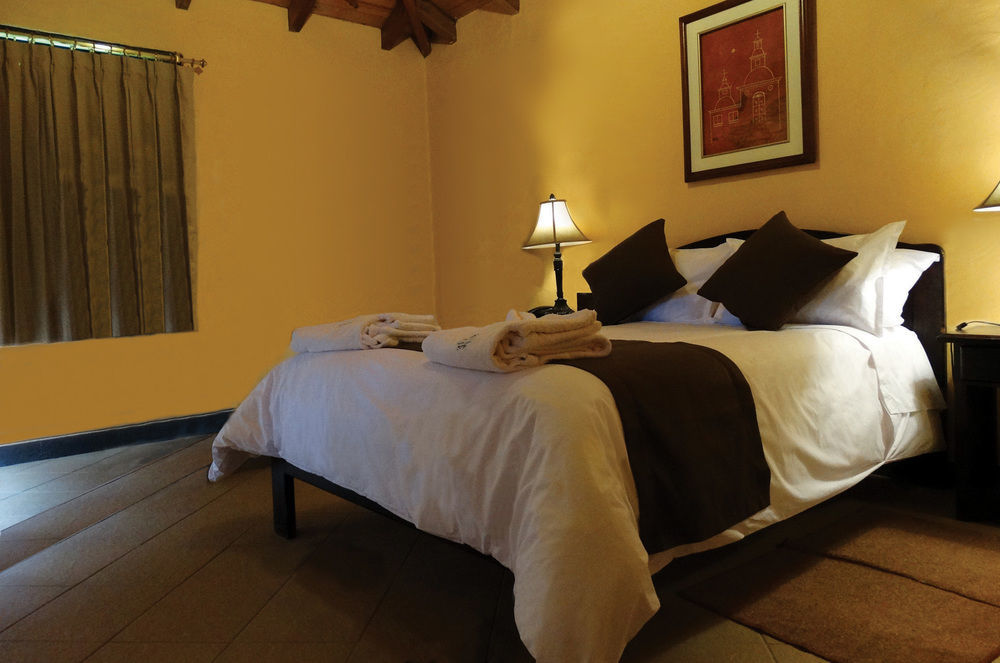 테르마스 데 파팔락타 호텔 파파약타 외부 사진 A bedroom at the hotel